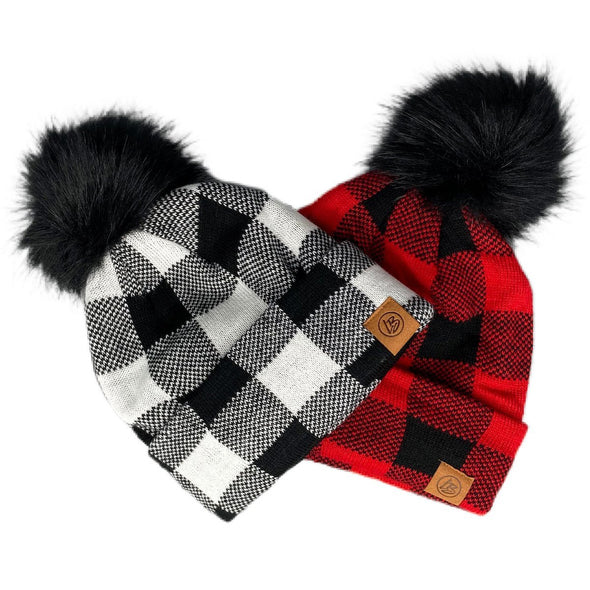 White and Red Buffalo Plaid Pom Beanies for babies, toddlers, kids and adults | Warm, cozy, fleece-lined beanie in a white buffalo plaid pattern for cold winter weather with a black faux-fur pom | LB Threads