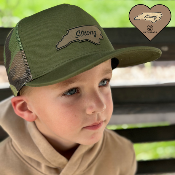 Green Camo Carolina Strong Snapback Hat | Olive green trucker hat with a green and brown camo mesh back. Support Hurricane Helene relief efforts with a Carolina Strong patch! | LB Threads