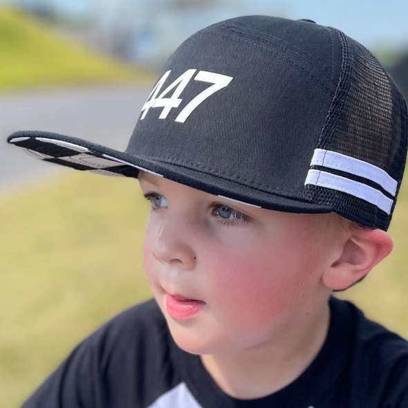 Black Checkered Custom Snapback Hat | Black trucker hat with white stripes on the mesh back and a checkered under brim. Make it your own with a custom patch! | LB Threads