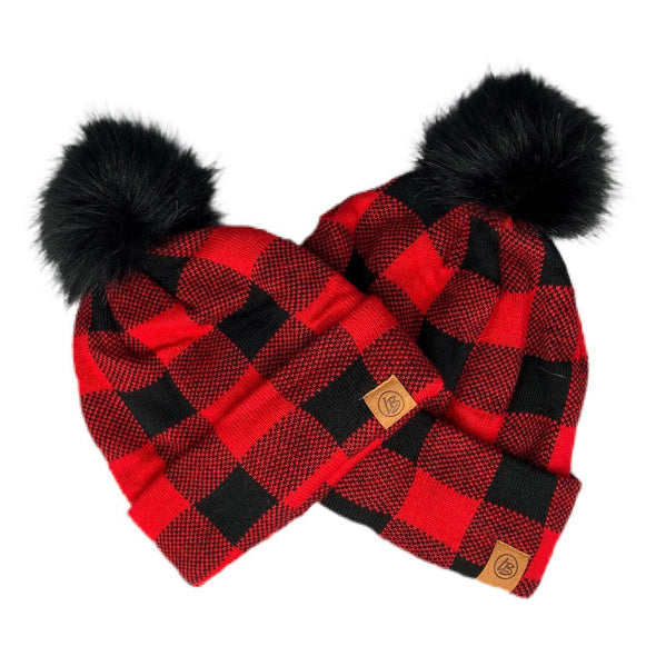 Red Buffalo Plaid Pom Beanies for babies, toddlers, kids and adults | Warm, cozy, fleece-lined beanie in a red buffalo plaid pattern for cold winter weather with a black faux-fur pom | LB Threads