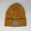 Shop online for beanies and snapback hats from LB Threads for babies, toddlers, kids and adults. Photo shows our Mini Beanie, a warm, soft, black, tan or cream acrylic beanie with a colored leather Mini patch.