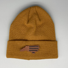 Shop online for beanies and snapback hats from LB Threads for babies, toddlers, kids and adults. Photo shows our Flag & State Beanie, a warm, soft, black, tan or cream acrylic beanie with a colored leather North Carolina patch.