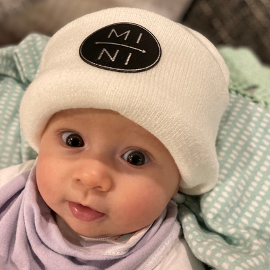 Shop online for beanies and snapback hats from LB Threads for babies, toddlers, kids and adults. Infant model wearing our Mini Beanie, a warm, soft, black, tan or cream acrylic beanie with a colored leather Mini patch.