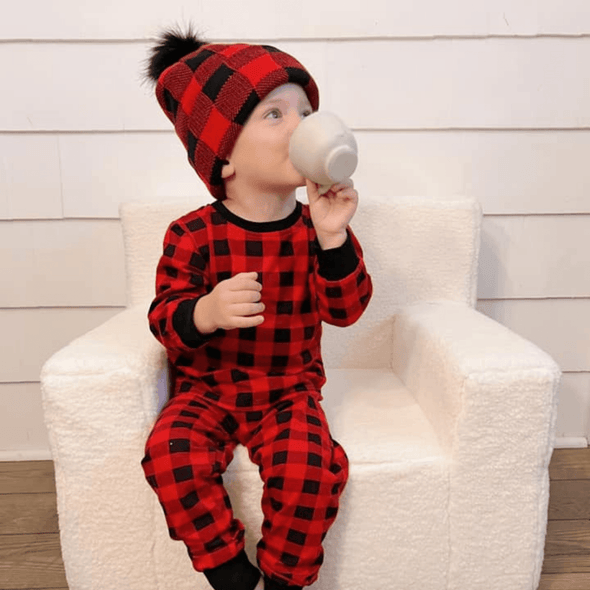 Shop online for beanies and snapback hats from LB Threads for babies, toddlers, kids and adults. Toddler model wearing the LB Threads Red Buffalo Pom Beanie, a cozy, soft red buffalo plaid topped with a black faux-fur pom, lined with super soft black minky fleece for extra warmth.
